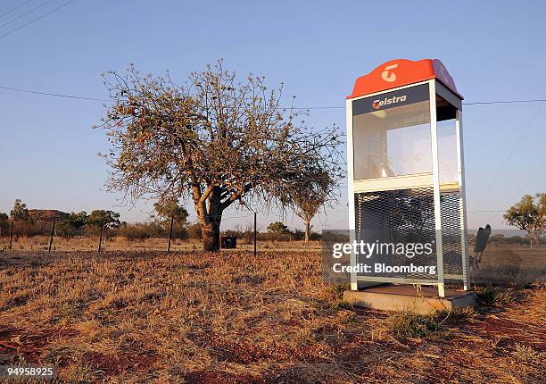 Telstra Corp. Public payphone stands in Cloncurry, Queensland, Australia, on Thursday, Sept. 17, 2009. Telstra Corp. Might postpone the break up of...