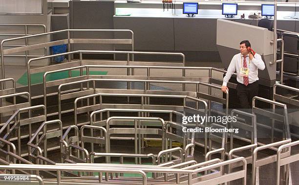 Trader works on an almost empty floor at the Brazilian Bolsa de Mercadorias e Futuros, or Brazilian Mercantile and Futures Exchange , in Sao Paulo,...