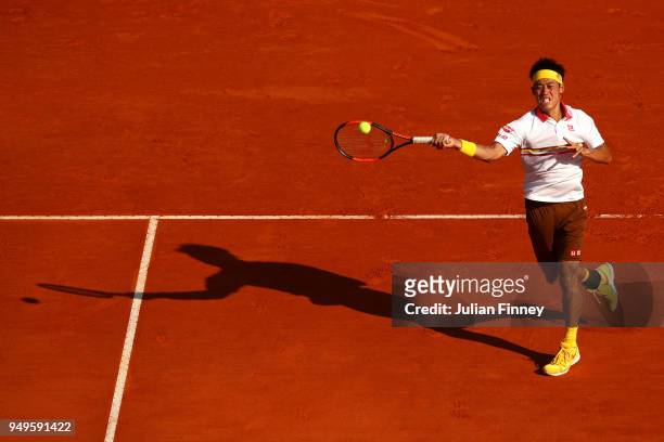 Kei Nishikori of Japan plays a forehand during his men's Semi-Final match against Alexander Zverev Jr. Of Germany during day seven of ATP Masters...