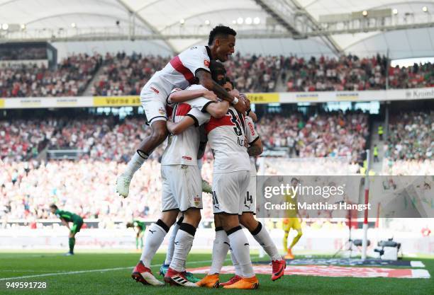 Berkay Oezcan of Stuttgart celebrates with his team-mates after scoring his team's second goal during the Bundesliga match between VfB Stuttgart and...