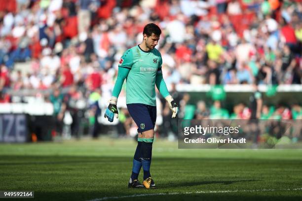 Philipp Tschauner of Hannover appears frustrated after the Bundesliga match between Hannover 96 and FC Bayern Muenchen at HDI-Arena on April 21, 2018...