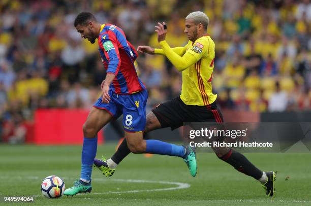 Ruben Loftus-Cheek of Crystal Palace runs with the ball under pressure from Etienne Capoue of Watford during the Premier League match between Watford...