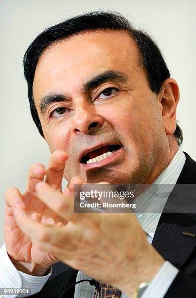 Carlos Ghosn, chief executive officer of Nissan Motor Co., speaks at a news conference after the company's annual general shareholders meeting in...