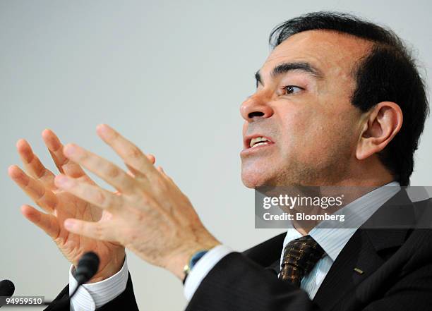 Carlos Ghosn, chief executive officer of Nissan Motor Co., speaks at a news conference after the company's annual general shareholders meeting in...