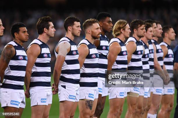 Geelong lines up for the Anzac day ceremony during the round five AFL match between the Port Adelaide Power and the Geelong Cats at Adelaide Oval on...