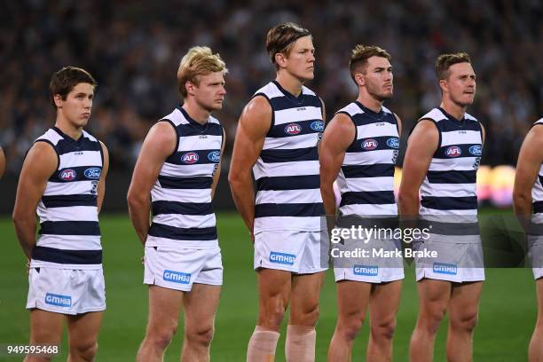 Geelong lines up for the Anzac day ceremony during the round five AFL match between the Port Adelaide Power and the Geelong Cats at Adelaide Oval on...