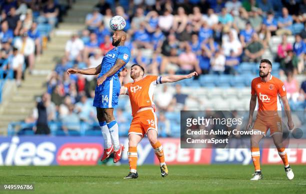 Gillingham's Josh Parker vies for possession with Blackpool's Jimmy Ryan during the Sky Bet League One match between Gillingham and Blackpool at...