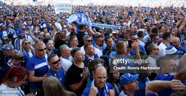 Supporters of 1. FC Magdeburg celebrate their Second Bundesliga promotion after the 3. Liga match between 1. FC Magdeburg and SC Fortuna Koeln at...