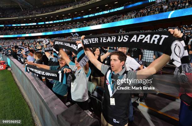 Port Adelaide fans sing You Can Never Tear us Apart before the round five AFL match between the Port Adelaide Power and the Geelong Cats at Adelaide...