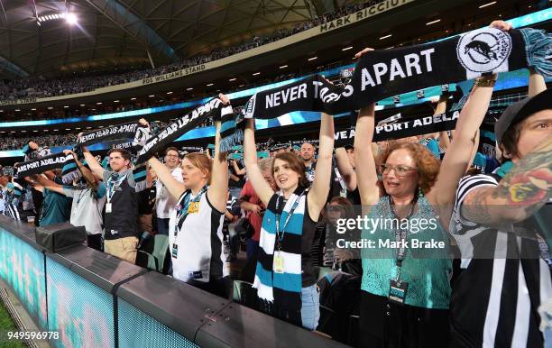 Port Adelaide fans sing You Can Never Tear us Apart before the round five AFL match between the Port Adelaide Power and the Geelong Cats at Adelaide...