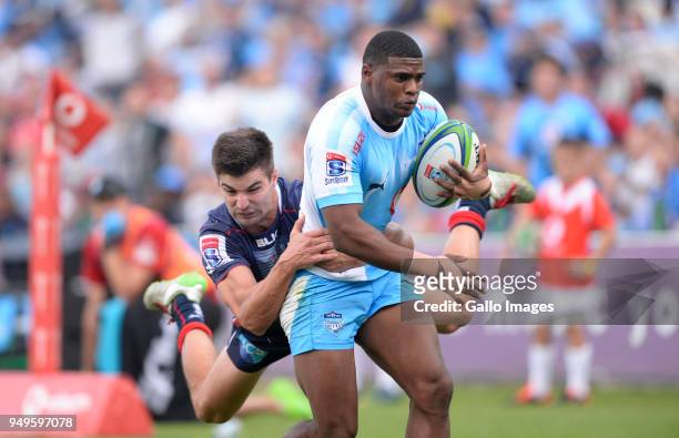 Warrick Gelant of the Bulls tackled by Jack Maddocks of the Rebels during the Super Rugby match between Vodacom Bulls and Rebels at Loftus Versfeld...