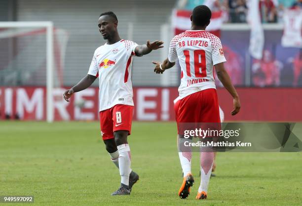 Naby Deco Keita of Leipzig and team mate Ademola Lookman show their frustration after loosing the Bundesliga match between RB Leipzig and TSG 1899...