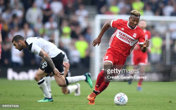 Adama Traore of Middlesbrough gets past Bradley Johnson of Derby County during the Sky Bet Championship match between Derby and Middlesbrough at iPro...