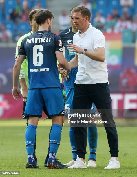 Head coach Julian Nagelsmann of Hoffenheim and Havard Nordtveit look on after winning the Bundesliga match between RB Leipzig and TSG 1899 Hoffenheim...