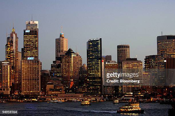Office buildings are illuminated in the central business district of Sydney, Australia, on Tuesday, June 23, 2009. Australia's S&P/ASX 200 Index...