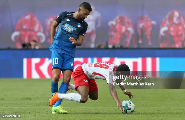 Ademola Lookman of Leipzig battles for the ball with Kerem Demirbay of Hoffenheim during the Bundesliga match between RB Leipzig and TSG 1899...