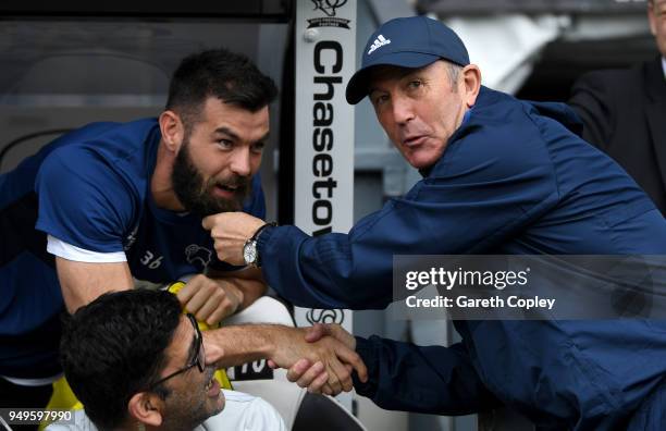 Middlesbrough manager Tony Pulis pulls Joe Ledley of Derby County's beard the Sky Bet Championship match between Derby and Middlesbrough at iPro...