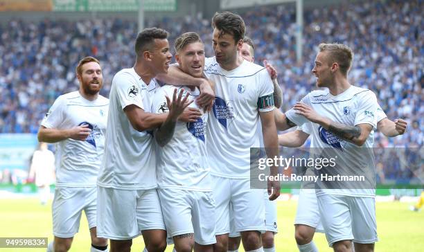 Philip Tuerpitz of 1. FC Magdeburg celebrates after scoring his team's opening goal with Nico Hammann , Marcel Costly, Christian Beck and Nils Butzen...