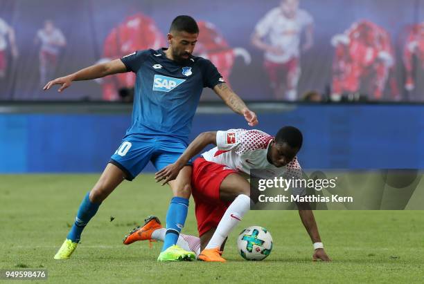 Ademola Lookman of Leipzig battles for the ball with Kerem Demirbay of Hoffenheim during the Bundesliga match between RB Leipzig and TSG 1899...