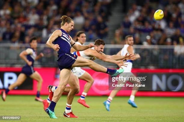 Nathan Fyfe of the Dockers passes the ball during the round five AFL match between the Fremantle Dockers and the Western Bulldogs at Optus Stadium on...