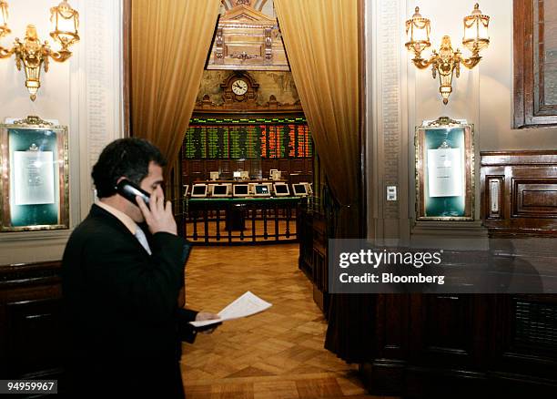 Man talks on the phone inside the Santiago Stock Exchange in Santiago Chile, on Tuesday, June 2, 2009. Declines in the ISPA Index of the Santiago...