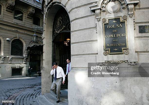 People leave the Santiago Stock Exchange in Santiago Chile, on Tuesday, June 2, 2009. Declines in the ISPA Index of the Santiago Stock Exchange today...