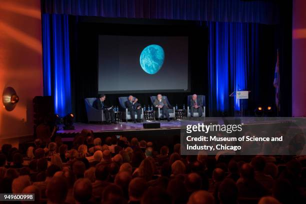 Onstage at the Museum of Science and Industry, from left, American author Robert Kurson interviews astronauts William Anders, James Lovell, and Frank...