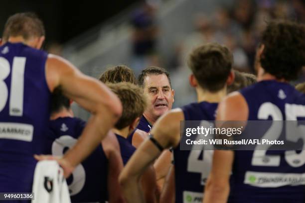 Ross Lyon, Senior Coach of the Dockers, addresses the players at the quarter time break during the round five AFL match between the Fremantle Dockers...