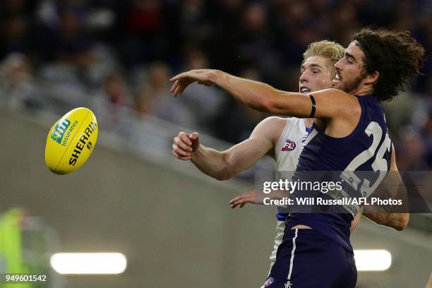 Alex Pearce of the Dockers contests a ruck with Tim English of the Bulldogs during the round five AFL match between the Fremantle Dockers and the...