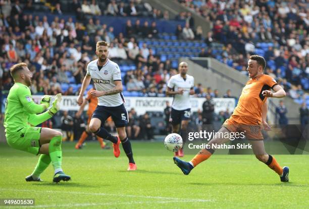 Diogo Jose Teixeira da Silva of Wolverhampton Wanderers scores their third goal of the game during the Sky Bet Championship match between Bolton...