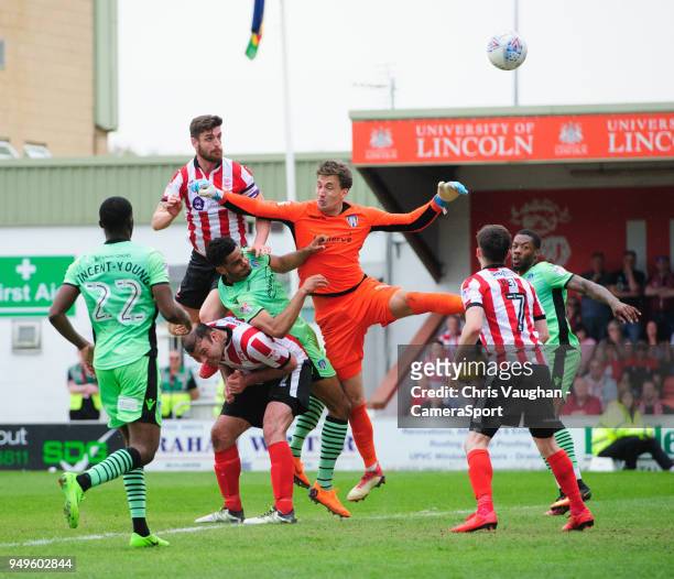 Lincoln City's Luke Waterfall scores his sides second goal during the Sky Bet League Two match between Lincoln City and Colchester United at Sincil...