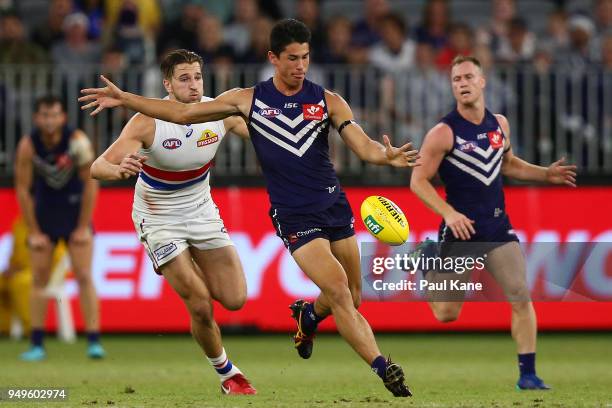 Bailey Banfield of the Dockers passes the ball during the round five AFL match between the Fremantle Dockers and the Western Bulldogs at Optus...