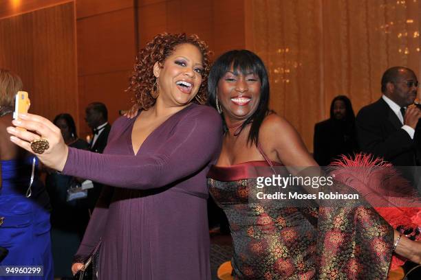 Actress Kim Coles and television host KiKi Shepard attend the 26th anniversary UNCF Mayor's Masked Ball at Atlanta Marriot Marquis on December 19,...