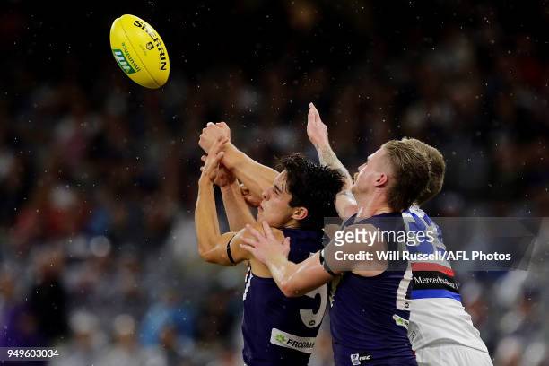 Aaron Naughton of the Bulldogs spoils during the round five AFL match between the Fremantle Dockers and the Western Bulldogs at Optus Stadium on...