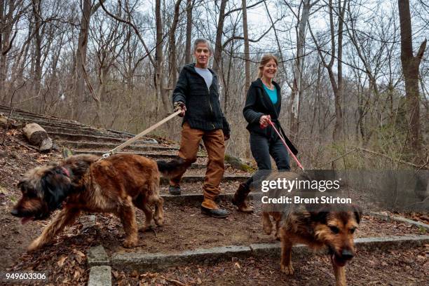 Dr Jean Bennet, Molecular Geneticist, and her husband, Professor of Ophthalmology, Dr Albert Maguire, are seen with their dogs Mercury and Venus in...