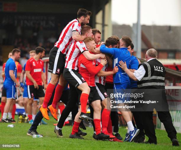 Lincoln City's Luke Waterfall celebrates scoring his sides second goal during the Sky Bet League Two match between Lincoln City and Colchester United...
