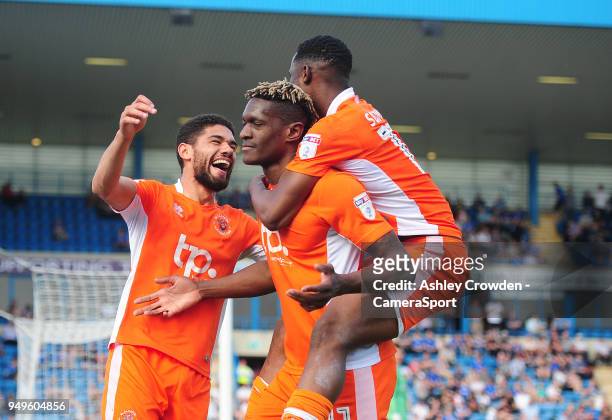 Blackpool's Kelvin Mellor celebrates scoring his side's third goal with team mates Armand Gnanduillet and Viv Solomon-Otabor during the Sky Bet...