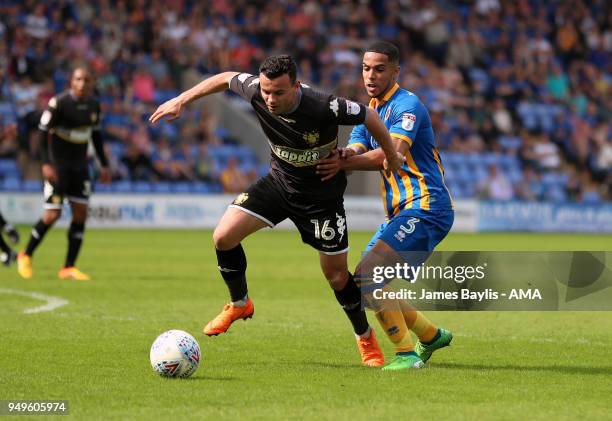 Zeli Ismail of Bury and Max Lowe of Shrewsbury Town during the Sky Bet League One match between Shrewsbury Town and Bury at New Meadow on April 21,...