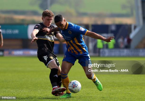 Ryan Cooney of Bury and Max Lowe of Shrewsbury Town during the Sky Bet League One match between Shrewsbury Town and Bury at New Meadow on April 21,...