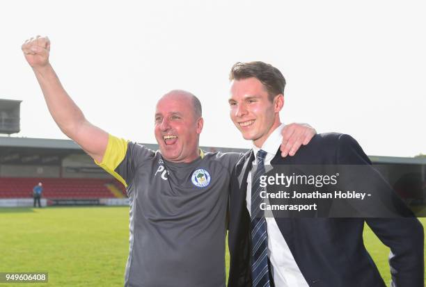 Wigan's manager Paul Cook with chairman David Sharke after securing promotion to the Championship during the Sky Bet League One match between...