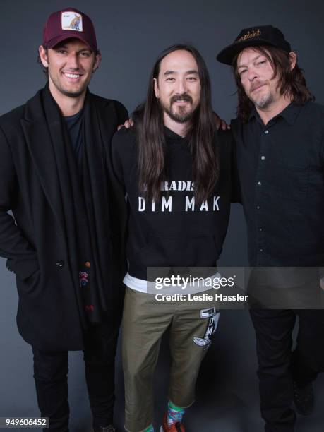 Alex Pettyfer, Steve Aoki, and Norman Reedus pose for a portrait during the Jury Welcome Lunch - 2018 Tribeca Film Festival at Tribeca Film Center on...