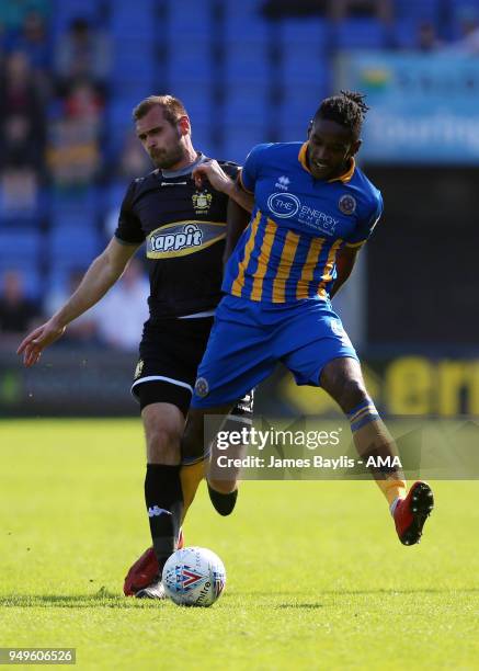 James Hanson of Bury and Omar Beckles of Shrewsbury Town during the Sky Bet League One match between Shrewsbury Town and Bury at New Meadow on April...