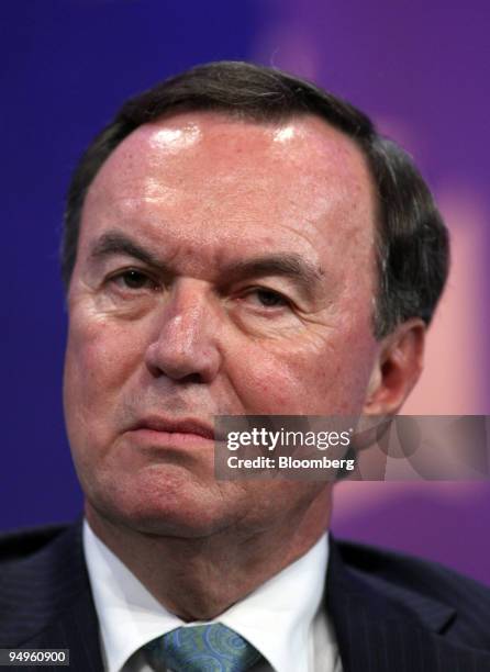 Mike Duke, president and chief executive officer of Wal-Mart Stores Inc., listens to a comment during the opening session of the Clinton Global...