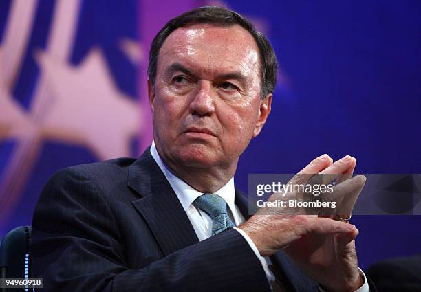 Mike Duke, president and chief executive officer of Wal-Mart Stores Inc., listens to a comment during the opening session of the Clinton Global...