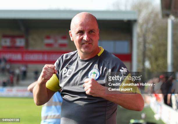 Wigans manager Paul Cook celebrates after securing promotion to the Championship during the Sky Bet League One match between Fleetwood Town and Wigan...