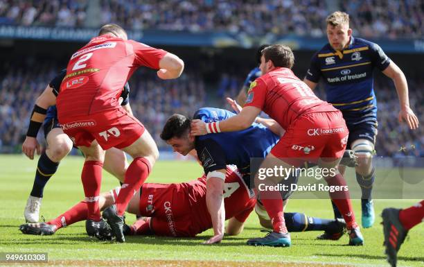 James Ryan of Leinster dives over for the first try during the European Rugby Champions Cup Semi-Final match between Leinster Rugby and Scarlets at...