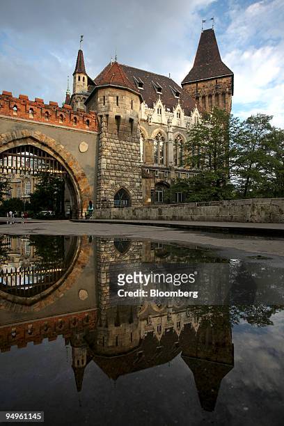 Vajdahunyad Castle is reflected in the water at City Park in Budapest, Hungary, on Saturday, June 27, 2009. Hungary's economic sentiment index rose...