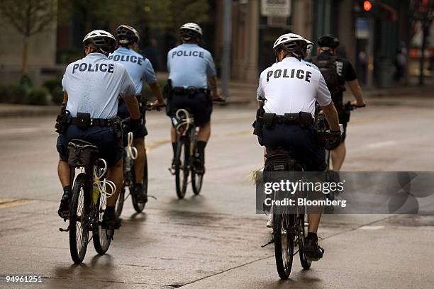 Police officers patrol on their bikes before the start of the Group of 20 summit in Pittsburgh, Pennsylvania, U.S., on Wednesday, Sept. 23, 2009....