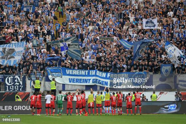 The players of Hertha BSC celebrate the 0:3 away victory with the fans after the match between Eintracht Frankfurt and Hertha BSC at the...
