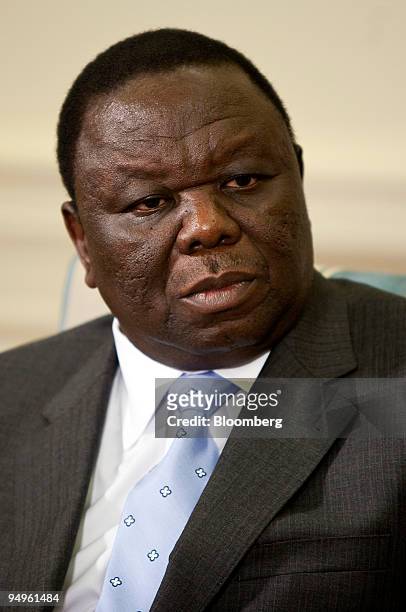 Morgan Tsvangirai, Zimbabwe's prime minister, listens to U.S. President Barack Obama during a meeting in the Oval Office the White House in...